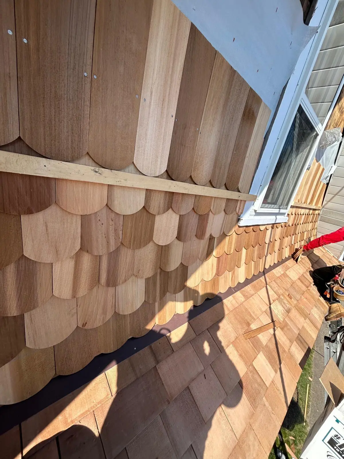 Siding crew on a home in Smithfield, RI