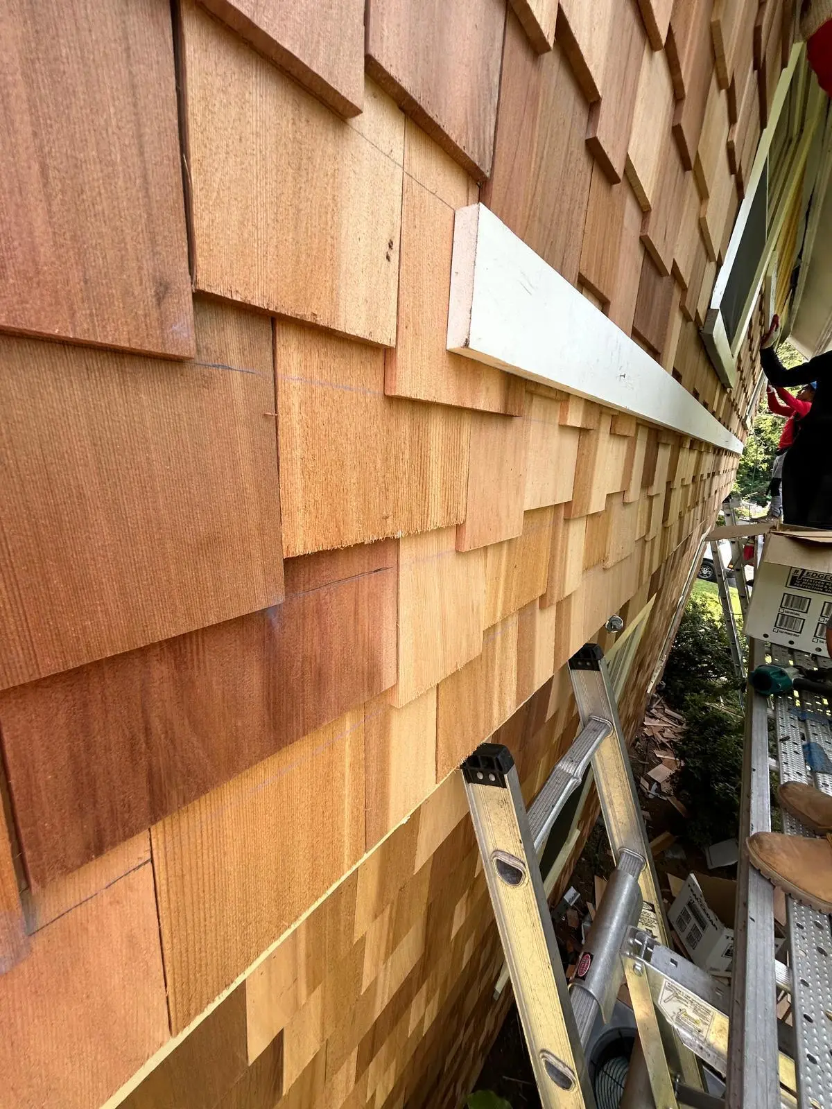 Siding crew on a home in Warwick, RI