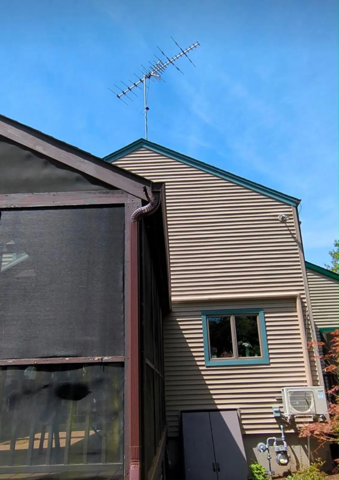 Gutter repair at a leaking seam in Rhode Island