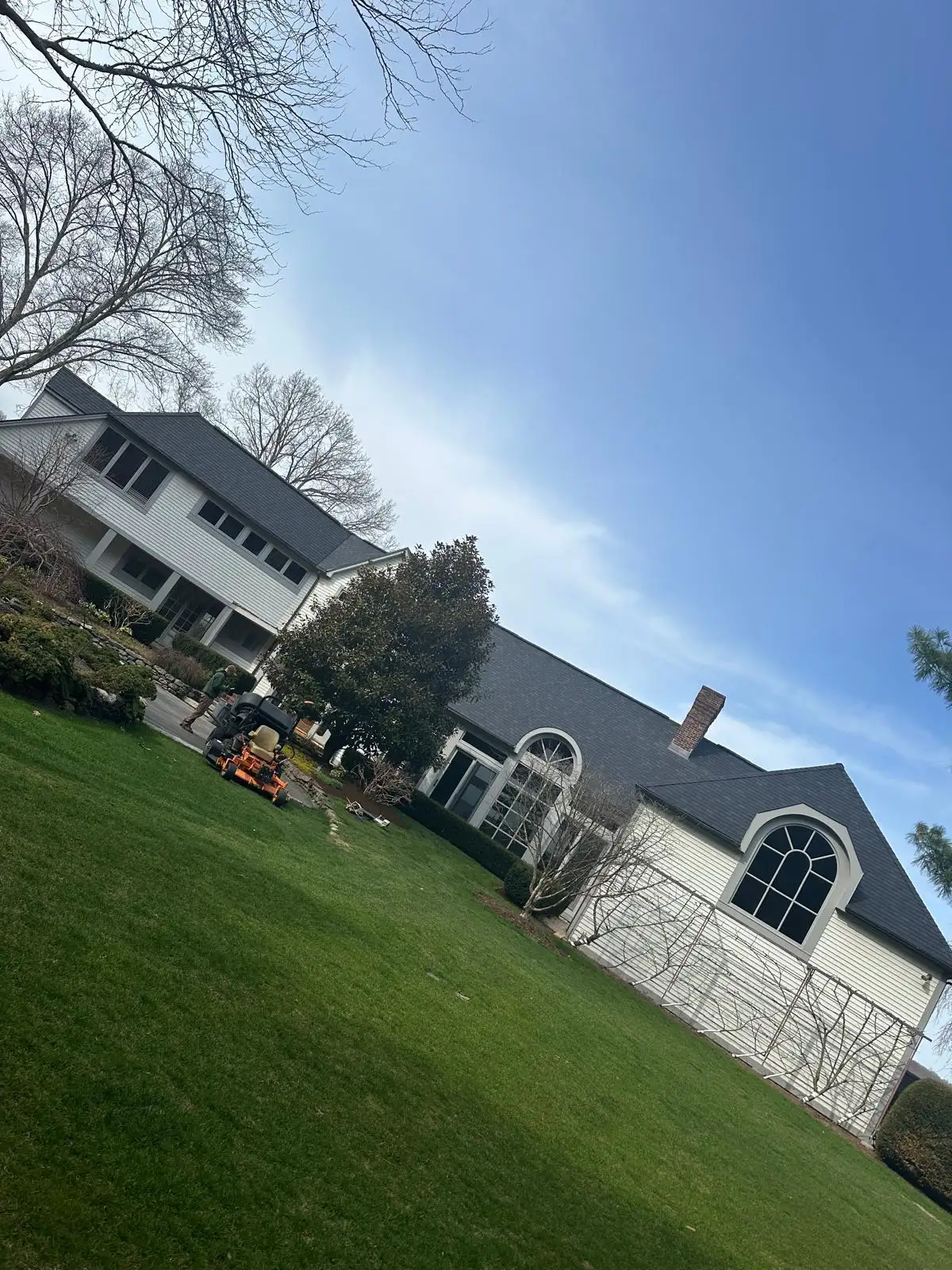 Storm damage inspection on a Rhode Island roof after a nor&rsquo;easter